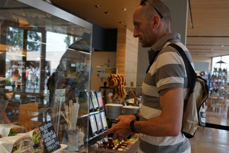 Customer redeems rewards points at local café