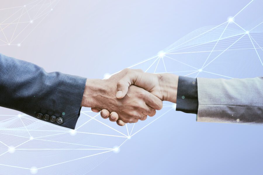 Innovation corporate business concept of two men shaking hands